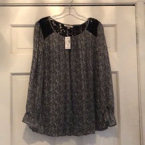 Flirty and feminine blouse!